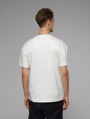 pinqponq • t-shirt unisex • dandelion white